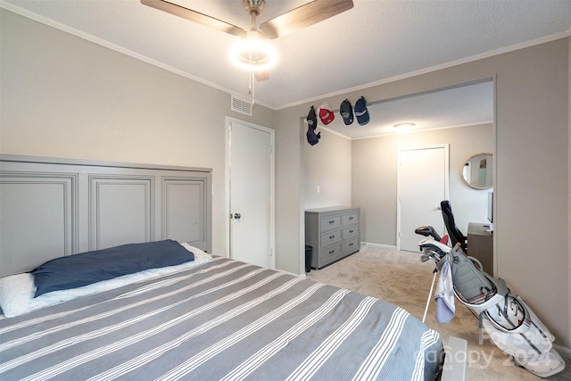 bedroom featuring ceiling fan, light colored carpet, and ornamental molding