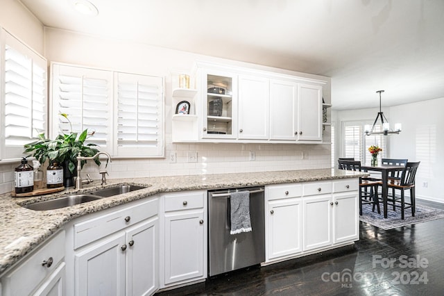 kitchen with stainless steel dishwasher, sink, white cabinets, and dark wood-type flooring