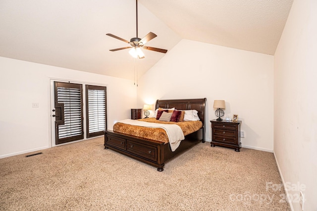 carpeted bedroom with ceiling fan and high vaulted ceiling