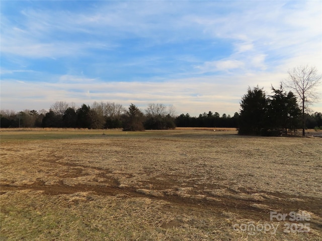 exterior space with a rural view