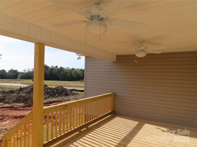 wooden deck with ceiling fan