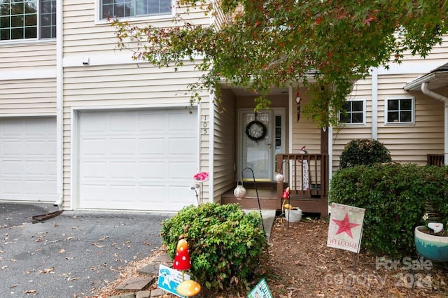 exterior space with a garage