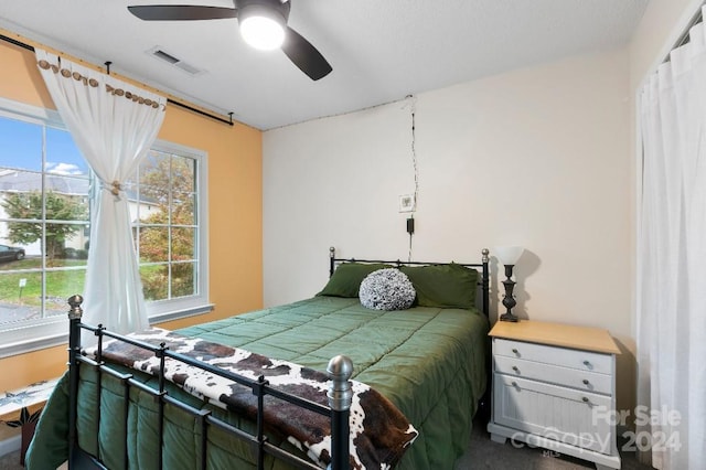 bedroom featuring carpet floors and ceiling fan