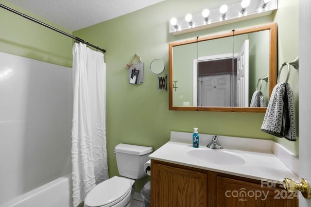 full bathroom with vanity, shower / bath combination with curtain, a textured ceiling, and toilet