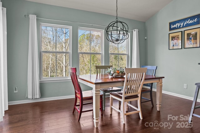 dining area featuring plenty of natural light, baseboards, and wood finished floors