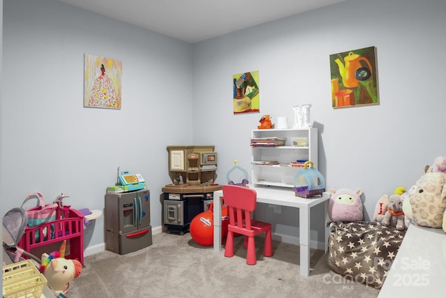 game room featuring carpet floors and baseboards