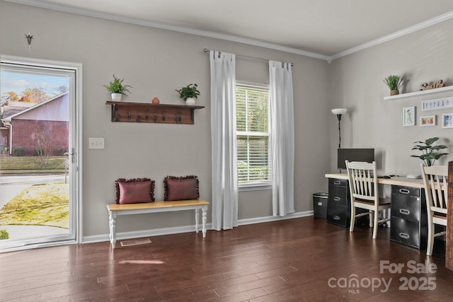 office featuring baseboards, wood finished floors, and crown molding