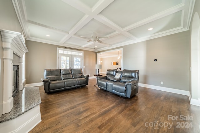 living room with a high end fireplace, ornamental molding, coffered ceiling, dark wood-type flooring, and beamed ceiling