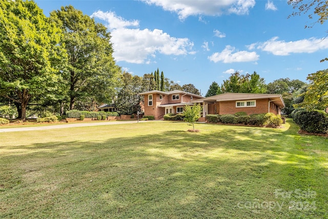 view of front of home with a front yard