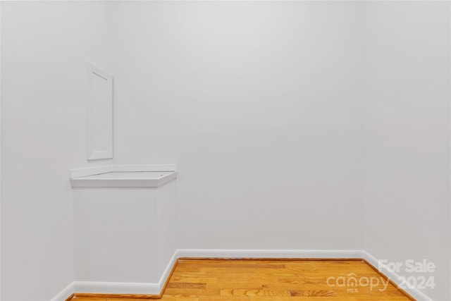 spacious closet featuring hardwood / wood-style floors