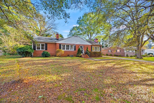 single story home featuring a front yard