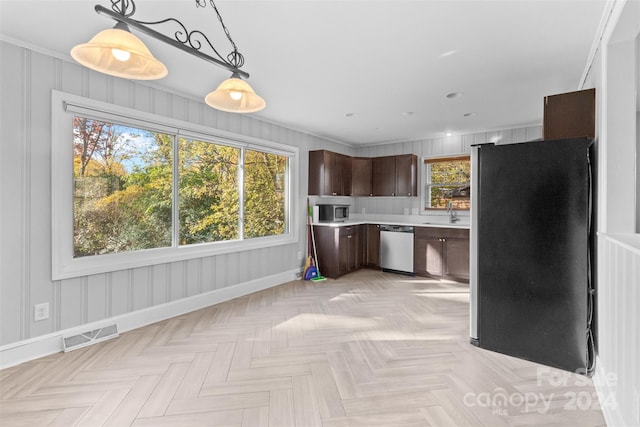 kitchen featuring dark brown cabinets, stainless steel appliances, light parquet floors, and hanging light fixtures