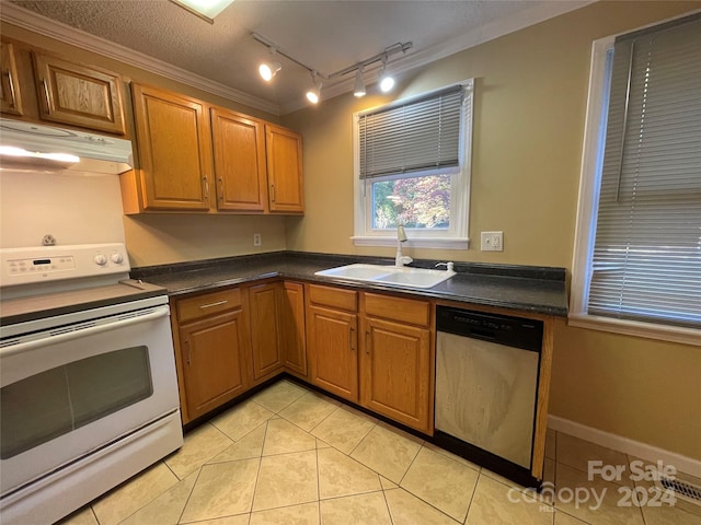 kitchen featuring a textured ceiling, sink, light tile patterned floors, electric range, and dishwasher