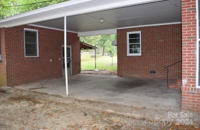 view of patio featuring a carport