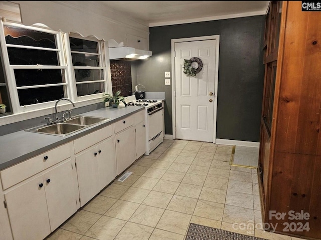 kitchen with white cabinetry, gas range gas stove, sink, ventilation hood, and light tile patterned floors