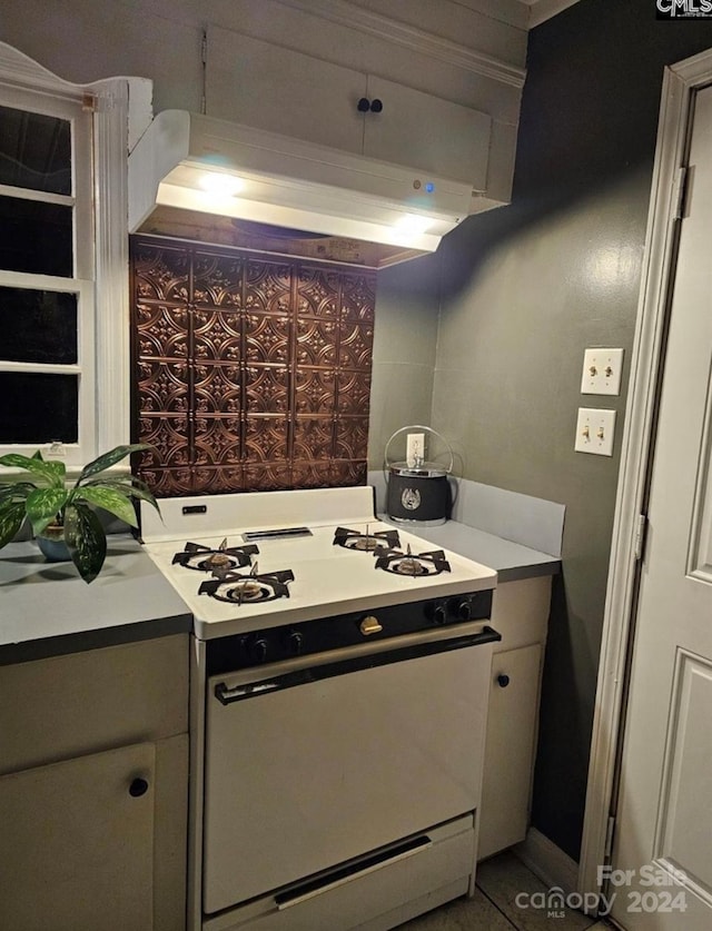 kitchen featuring white range