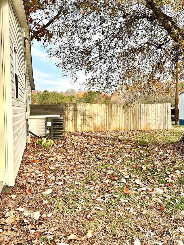 view of yard with central AC