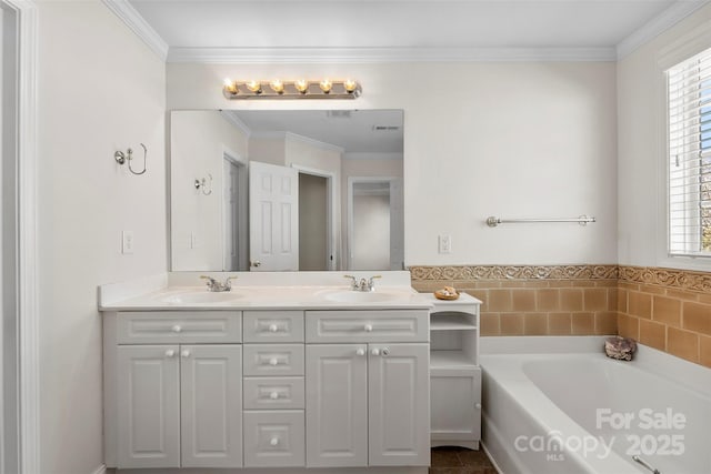 full bath with plenty of natural light, a sink, and a bath