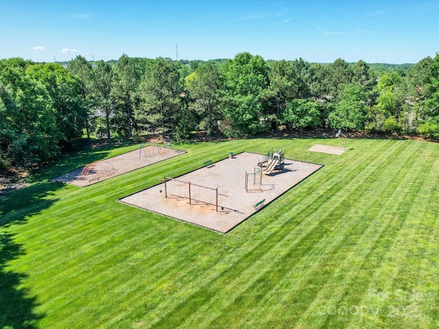 view of yard featuring volleyball court