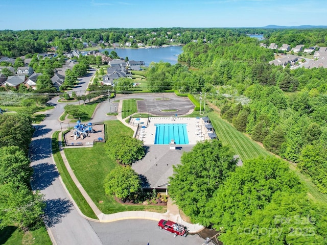 birds eye view of property featuring a water view