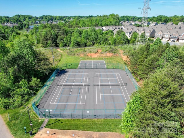 view of tennis court with fence