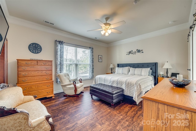 bedroom featuring ceiling fan, dark wood-type flooring, and crown molding