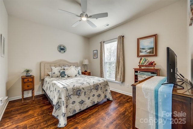 bedroom featuring ceiling fan and dark wood-type flooring