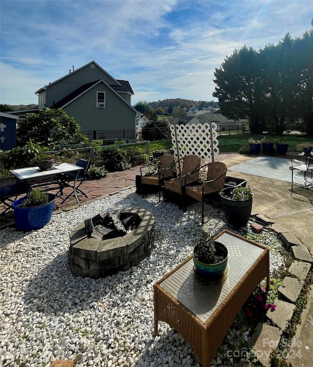 view of patio / terrace featuring a fire pit