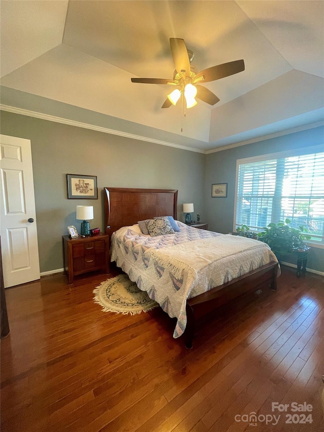 bedroom with lofted ceiling, ceiling fan, and dark hardwood / wood-style floors