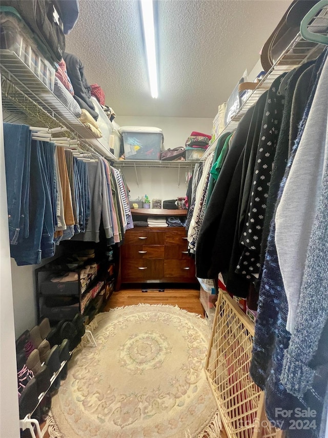 spacious closet with light wood-type flooring