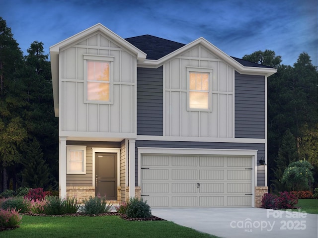 view of front of property with a garage