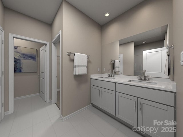 bathroom with double vanity, recessed lighting, a sink, and baseboards