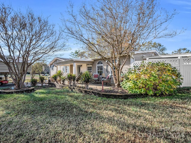 exterior space with a front yard