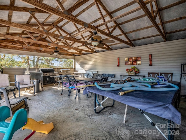 view of patio featuring an outdoor kitchen and ceiling fan