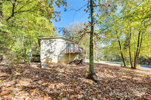 view of yard featuring a deck