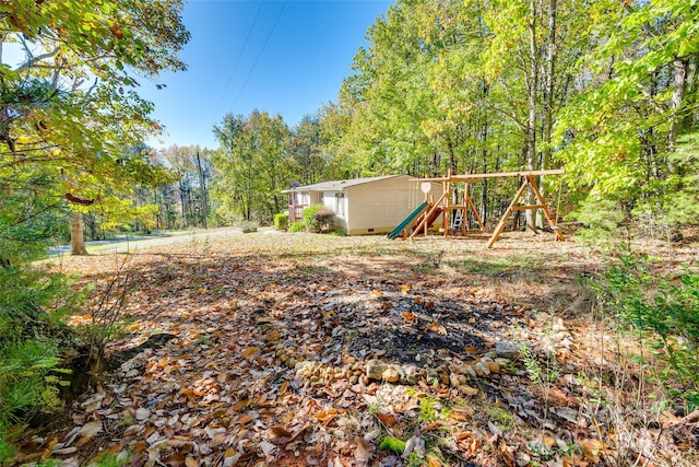 view of yard featuring a playground