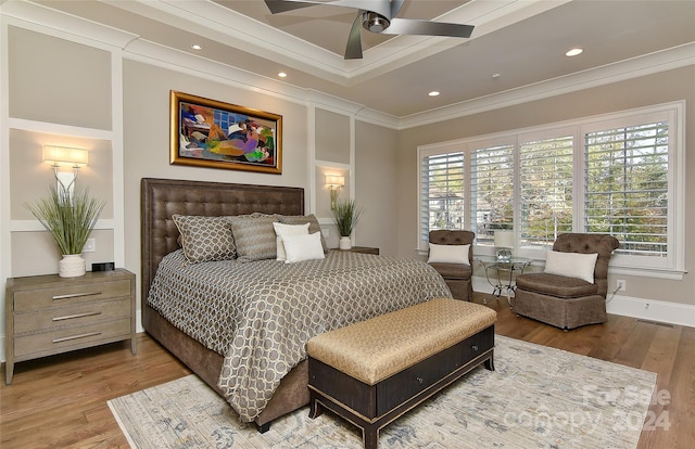 bedroom with wood-type flooring, ceiling fan, and ornamental molding