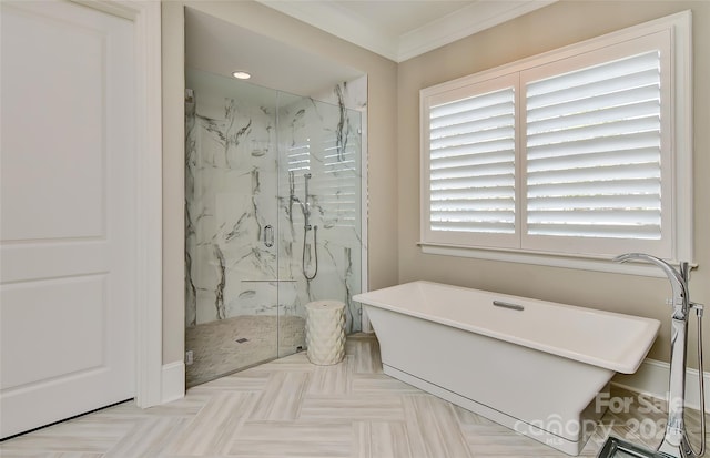 bathroom with separate shower and tub and crown molding