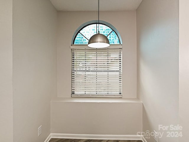 empty room featuring hardwood / wood-style floors