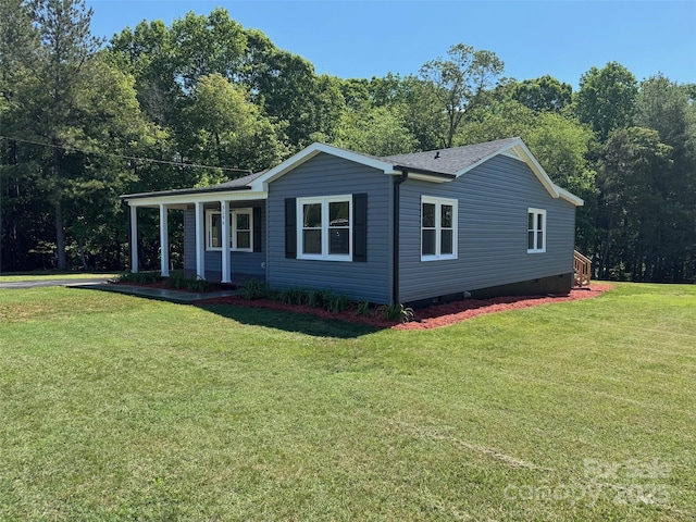 3596 Bethany Church Rd, Claremont, NC 28610 - view of front of house featuring a front lawn, crawl space, and a shingled roof