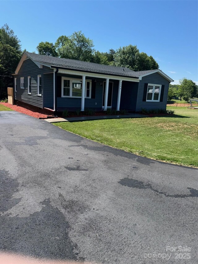 3596 Bethany Church Rd, Claremont, NC 28610 - single story home with a front lawn and a porch
