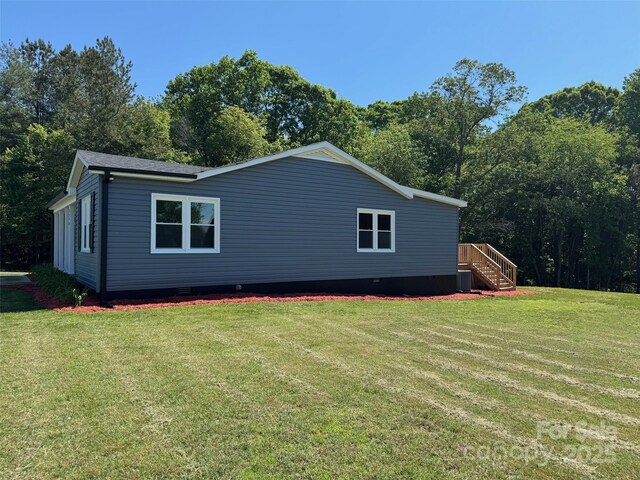 3596 Bethany Church Rd, Claremont, NC 28610 - view of side of property featuring crawl space, a lawn, and stairs