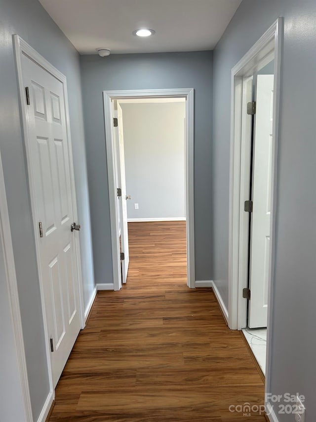 3596 Bethany Church Rd, Claremont, NC 28610 - hallway featuring wood finished floors, recessed lighting, and baseboards