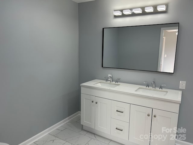 3596 Bethany Church Rd, Claremont, NC 28610 - bathroom with marble finish floors, baseboards, and double vanity