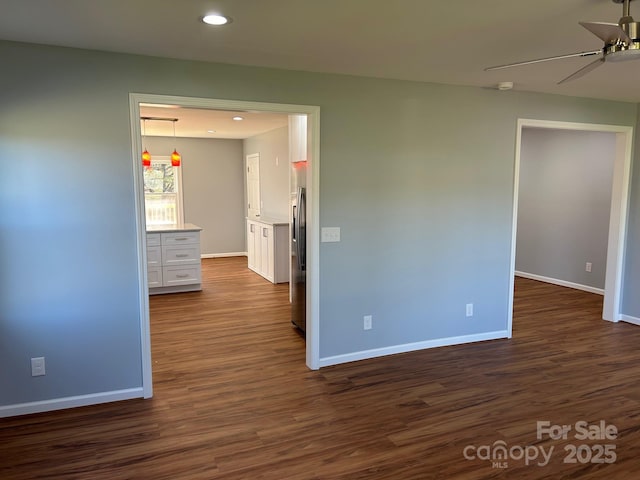 3596 Bethany Church Rd, Claremont, NC 28610 - unfurnished room with a ceiling fan, baseboards, dark wood-type flooring, and recessed lighting