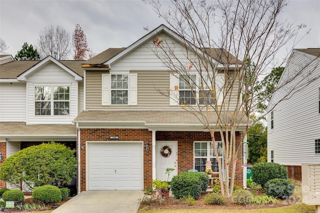 view of front of property with a garage