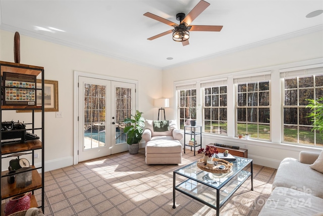 sunroom with ceiling fan and french doors