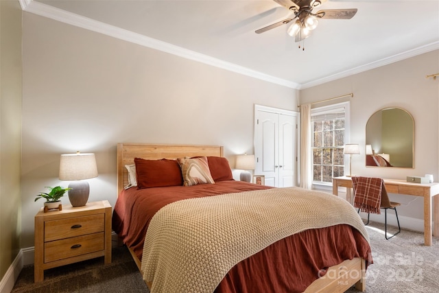 carpeted bedroom with ceiling fan and crown molding