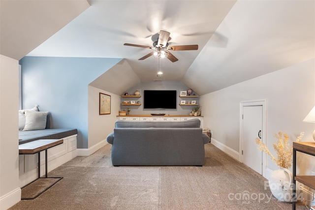 carpeted living room featuring vaulted ceiling and ceiling fan