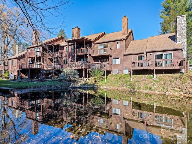 view of property with a water view